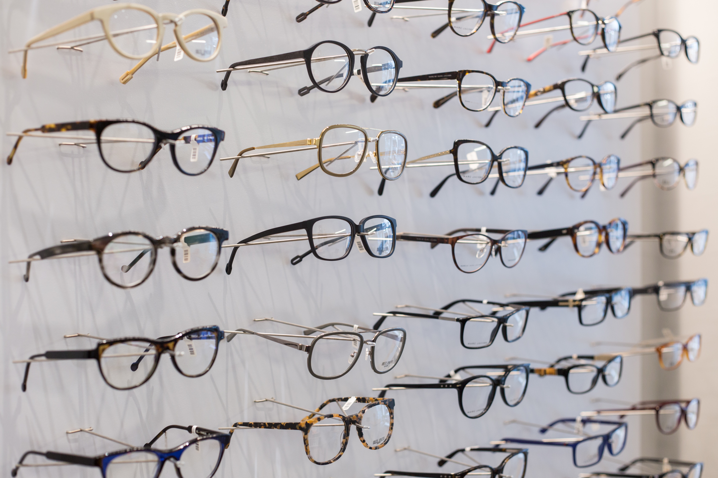 Choosing new sunglasses at De Wolf Opticiens