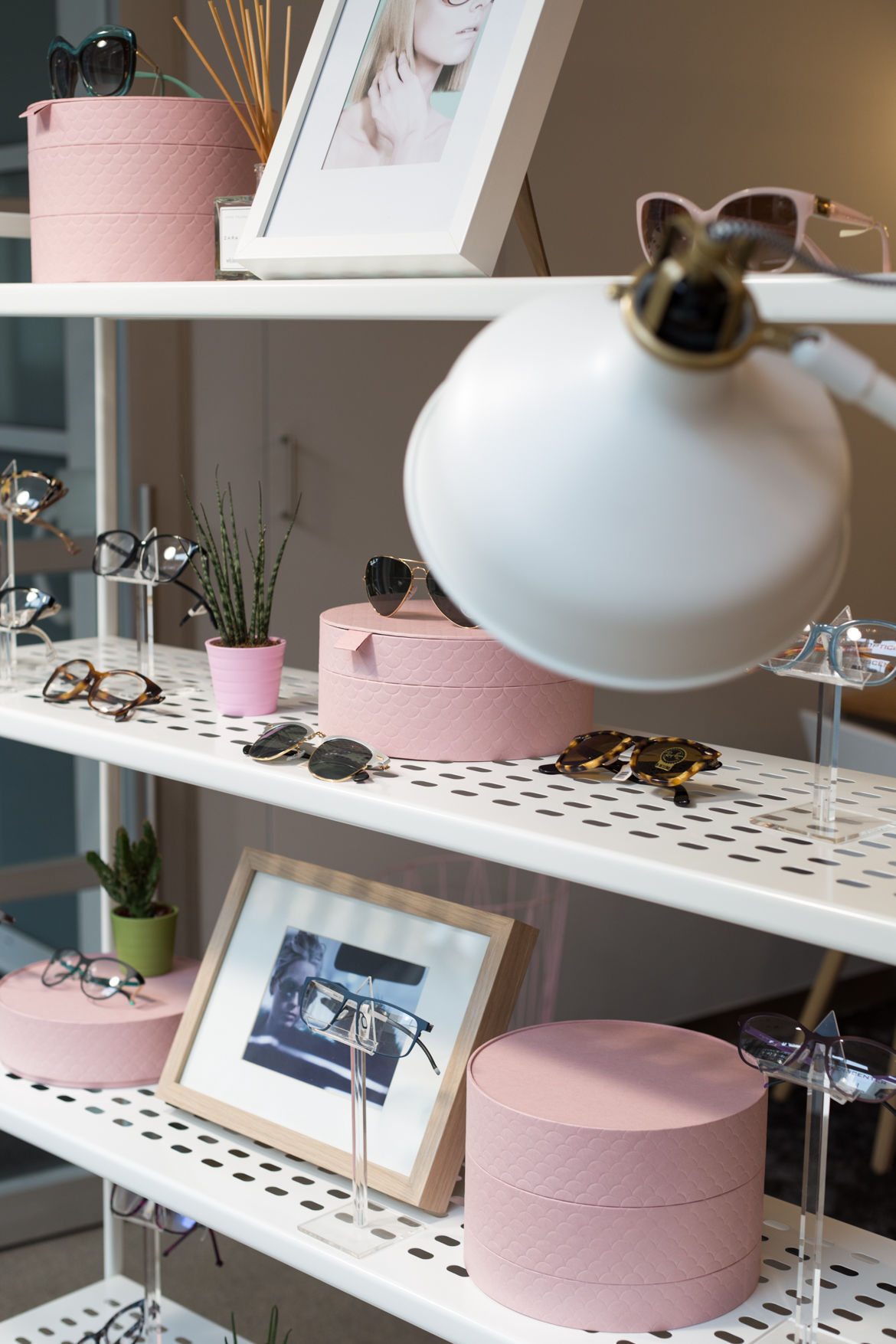 Choosing new sunglasses at De Wolf Opticiens