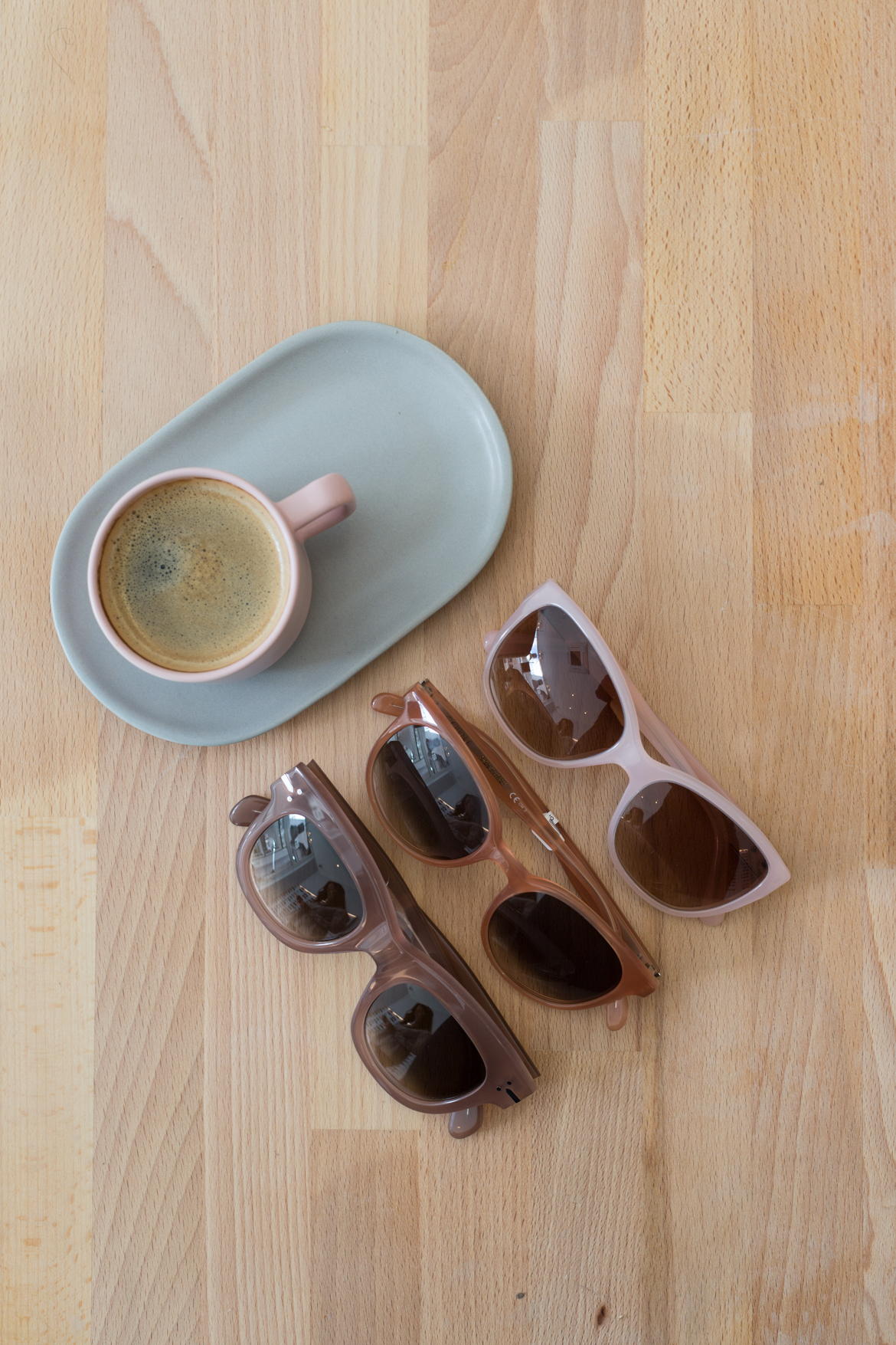 Choosing new sunglasses at De Wolf Opticiens